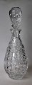 Crystal 
decanter with 
grindings, 20th 
century 
Germany. With 
stopper. H: 
29.5 cm.
Perfect 
condition!