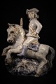 Glazed ceramic 
figure from 
L.Hjorth - 
Denmark. of 
rider.
H: 24cm. L: 
21cm. Design 
Gertrud 
Kudielka.