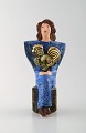Very rare Lisa 
Larson unique 
figure of 
sitting woman 
in blue with 
golden ...