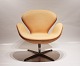 The Swan chair, 
model 3320, is 
a prominent 
example of Arne 
Jacobsen's 
iconic 
furniture 
design. ...