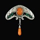 Bernhard Hertz. 
Art Nouveau 
Silver Brooch 
with Amber and 
Green Agate.
Designed and 
crafted by ...