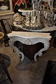 Swedish 1900 
Century console 
with curved 
legs, 
decorative 
carvings and 
white marble on 
top, and ...