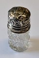 English crystal 
perfume bottle 
with silver 
lid, 19th 
century. 
Stamped. H: 5.7 
cm.