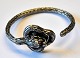 Twisted silver 
bracelet, 
decorated with 
dragon, 20th 
century. 
Presumably - 
Chinese. 
Internal ...
