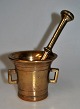 Smaller brass 
mortar with 
pistil. 19th 
century 
Denmark. Corpus 
with two 
handles. H: 8.2 
cm. ...