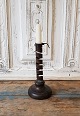 1800s spiral 
candlestick on 
wooden foot
Height 21 cm.