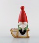 Lisa Larson for 
Gustavsberg. 
Candlestick. 
Elf in glazed 
stoneware. 
Dated 1995.
In very good 
...