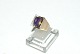 Gold ring 
ladies with 
purple stone 14 
carat gold
Size 56
Nice and well 
maintained ...