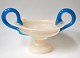 Bowl in light 
opaline glass 
with blue 
handle, 19th 
century with 
gilding. H: 16 
cm. Diameter: 
...