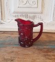 Cream jug in 
red pressed 
glass from 
Fyens Glasværk
Produced 
between 1924-34
Height 10 cm.