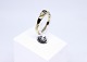 Ring of 14 
carat gold and 
decorated with 
a small 
diamond.
Size - 55.