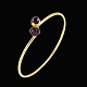 Danish 14k Gold 
Bangle with 
Amethysts.
Designed and 
crafted by 
Skrivers 
Guldvarefabrik 
1969 - ...