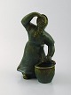 Michael 
Andersen 
pottery from 
Bornholm.
Large figure 
of fisherman's 
wife.
Measures: 23.5 
x 16 ...
