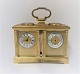 English travel 
clock with 
weather 
station. There 
are clock, 
barometer, 
compass and 
thermometer. 
...