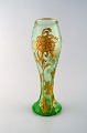 Montjoye, 
France. Large 
art nouveau 
vase in 
mouth-blown art 
glass. 
Decorated with 
flowers in ...