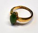 10 carat gold 
ring with jade, 
20th century 
USA. Weight: 2 
grams. Size: 
48.