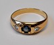 14 carat gold 
ring with 2 
brilliant cut 
diamonds and 
sapphire. 20th 
century 
Denmark. 
Stamped. ...
