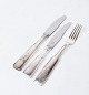 Dinner knife 
(625 DKK), 
lunch knife 
(575 DKK) and 
dinner fork 
(625 DKK) in 
heritage silver 
no. 2 ...