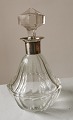 Glass Carafe in 
crystal. Silver 
Mounting with 
double pour 
spout. Stamped 
with three 
towers! ...