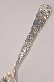 Sterling 
silver, Serving 
spoon with 
grape motif, 
Ice cream 
server, length 
29cm. 11 1/2 
inches. ...