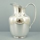 Cohr silver 
pitcher. 
Cohr; A 
pitcher of 
sterling 
silver, 
handle of 
massive silver. 
H. 19 ...