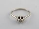 Danish 
goldsmith. Ring 
in 14 carat 
white gold with 
a brilliant of 
0.05 ct. Mid 
20th ...
