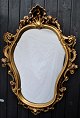 Gold plated 
mirror, rococo 
style, 20th 
century 90 x 68 
cm.
With less 
rejection.