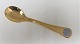 Georg Jensen. 
Silver cutlery. 
Year's teaspoon 
1980. Sterling 
(925) gilt. 
Length 11.2 cm