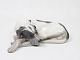 Royal 
Copenhagen 
porcelain 
figur, lying 
dog, no.: 1634.
5 x 20 cm.
