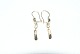 Elegant 
happiness 
galoshes ear 
studs 14 carat 
gold
Length 34.84 
mm
The jewelry 
checked by the 
...