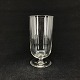 Height 12.5 cm.
Tubular toddy 
glass from 
Holmegaard 
Glasværk.
The glass is 
seen in the 
work's ...