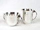 Set of sugar 
bowl and cream 
jug, no.: 456 
B, in 925 
sterling silver 
by Georg 
Jensen.
6 x 9 cm ...