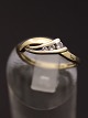 14 carat gold 
ring size 58 
with 3 clear 
stones stamped 
585 SC Nr. 
428059