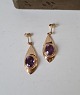 Pair of vintage 
earrings in 14 
kt gold with 
amethyst
Stamped: 585
Length 32 mm. 
Width 12 mm.