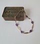 Vintage 
bracelet in 8 
kt gold with 
amethyst. 
The length can 
be adjusted 
from 20 - 24 
cm. ...