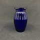Height 11.8 cm.
Blue press 
glass vase from 
Holmegaard.
It is shown in 
the 1938 
glassware ...