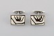 A pair of Royal 
Copenhagen 
cufflinks in 
sterling silver 
and porcelain. 
1960 / 70s.
Measures: ...
