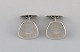 Danish 
silversmith. A 
pair of 
modernist 
cufflinks in 
sterling 
silver. 1960s / 
70s.
Measures: ...