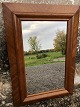 Small older 
mirror in 
mahogany 
veneer. 58x41 
cm. Frame and 
mirror glass 
with a few 
age-related ...