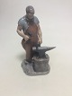 Royal 
Copenhagen 
figurine of a 
blacksmith no 
460. Old Bing 
and Grondahl 
number is ...