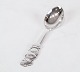 Children's 
spoon with 
motif of 
hallmarked 
silver.
15 cm.
