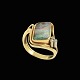 18k Gold & 
White Gold Ring 
with Opal and 
three Diamonds. 
Total 0,03ct
Stamped with 
18ct.
Size ...