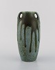 Denbac, France. 
Vase with 
handles in 
glazed ceramic. 
Beautiful 
running glaze 
in shades of 
blue ...