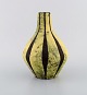 European studio 
ceramicist. 
Unique retro 
vase in glazed 
ceramics. Black 
/ yellow 
striped design. 
...