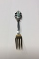 Anton Michelsen 
Christmas fork 
1930, gilded 
sterling silver 
with enamel.
The sculptor 
and ...