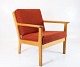 An armchair in 
oak and red 
wool fabric, 
designed by the 
renowned Danish 
furniture 
architect Hans 
...