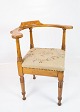 Armchair in 
polished oak 
and upholstered 
with light 
embroided 
fabric from the 
1910s. The 
chair ...