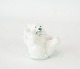 Royal porcelain 
figure seated 
polar bear no.: 
22747 by Royal 
Copenhagen.
Dimensions: 7 
x 7 cm.
