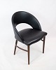 A recliner 
upholstered in 
black Elegance 
leather and 
with rosewood 
legs, designed 
by Chr. ...