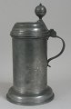Pewter drinking 
beer mug, 
Germany, also 
called drinking 
vessel, 19th 
century. With 
handle, gecko 
...